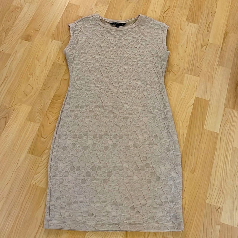 Sexy form-fitting khaki-colored dress with embossed details. Sz 12. Never worn!